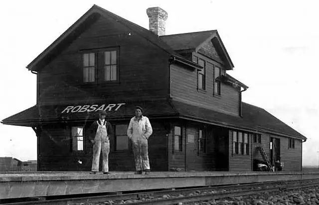 Robsart train station with two men on the platform
